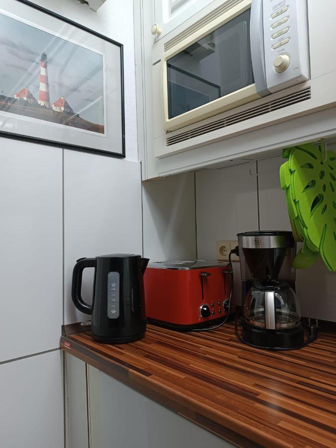 Ferien Wohnung -Leuchtturm Oldenswort Esterno foto