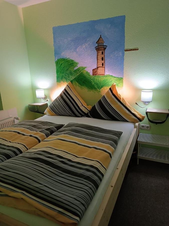 Ferien Wohnung -Leuchtturm Oldenswort Esterno foto