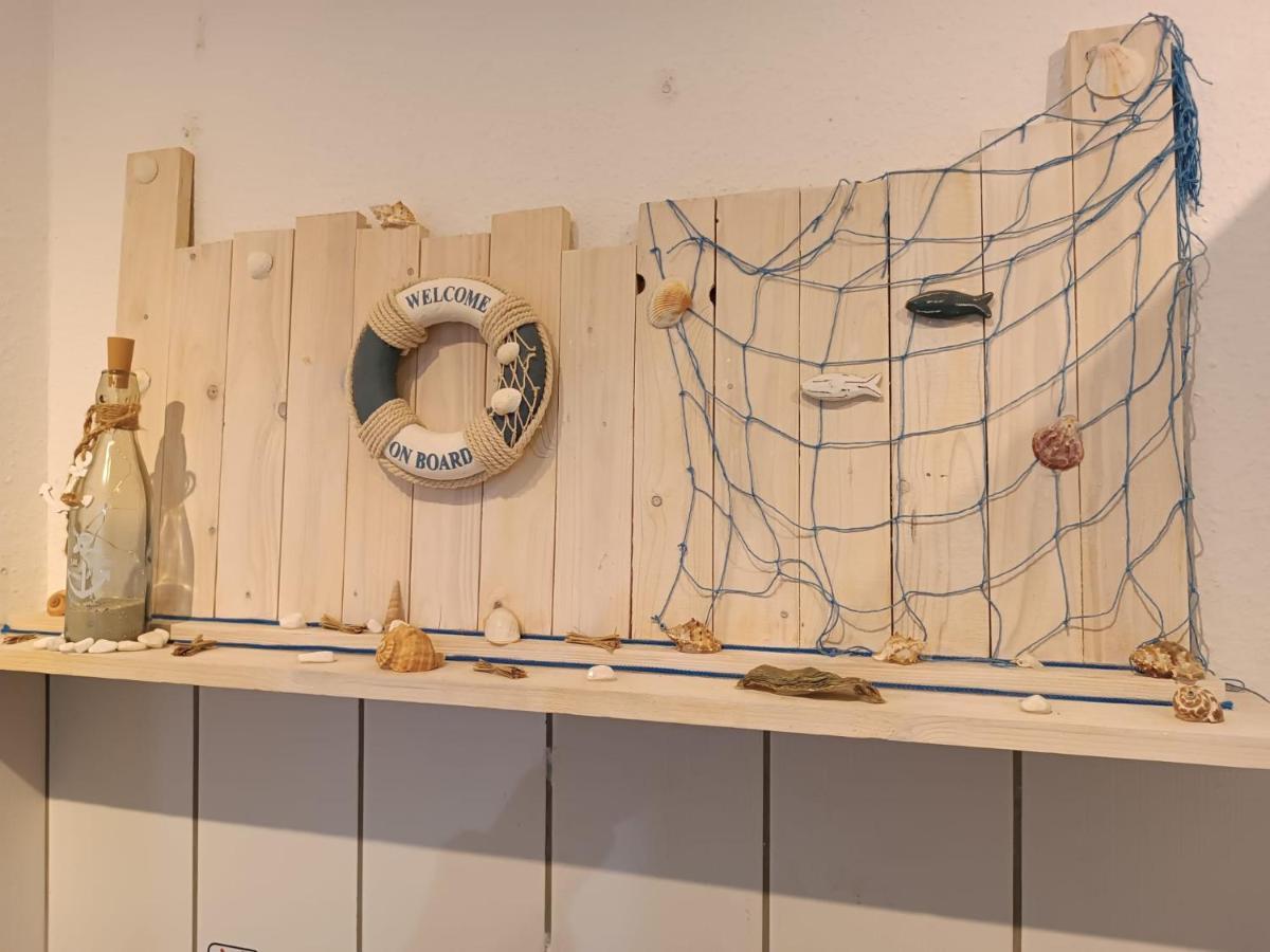 Ferien Wohnung -Leuchtturm Oldenswort Esterno foto
